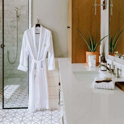 Waffle robe hanging by the shower